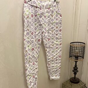 Women's stretch Skinny Pants - Wht, Purple, Green signature logo print NWT L/XL